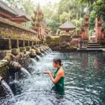 Visitor pathway and ticket information area at Tirta Empul Holy Water Temple Bali