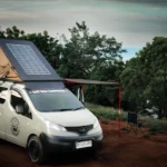 Bali campervan parked near coastal cliffs with ocean views and tropical greenery, ideal for flexible road trips, hotel-free exploration, and nature-based travel experiences.