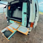 CAMPERVAN - EN - Home 34 Campervan parkir saat matahari terbenam di Pantai Virgin