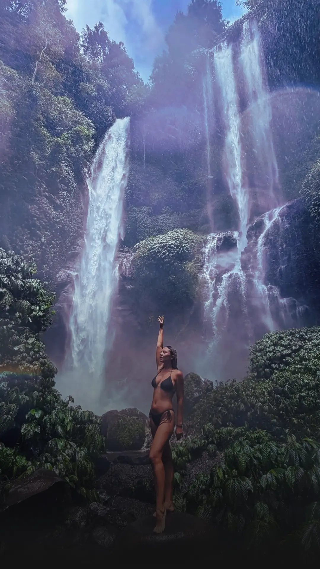 Sekumpul Waterfall Bali cascading through lush jungle in North Bali