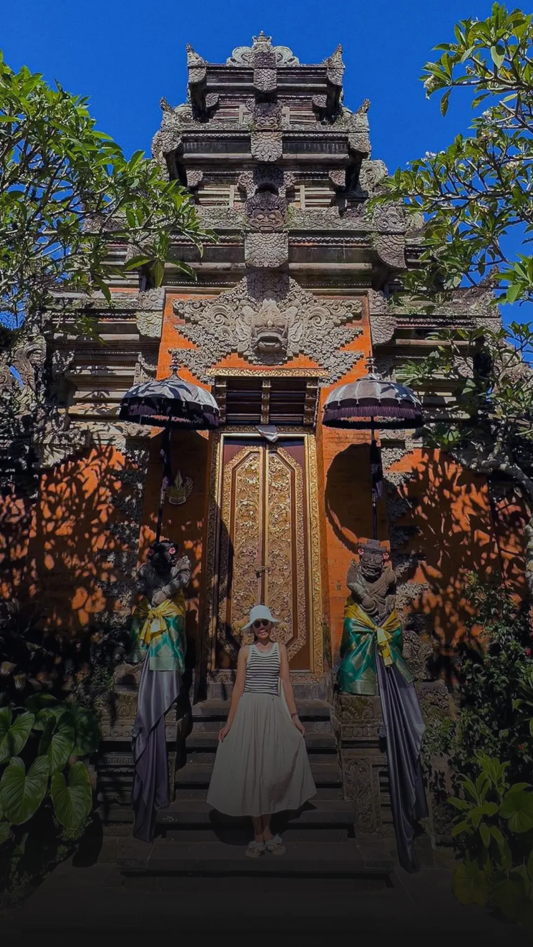 Home 7 Ubud Palace historical royal compound and classic Balinese stone gate structures