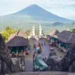 Visitor standing at the entrance stairs of Lempuyang Temple Bali on a private day tour.