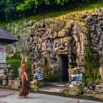 Goa Gajah sanctuary in morning light with mist over the forest in Bali
